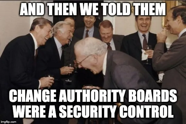 Men in dinner jackets laughing together, captioned “and then we told them change authority boards were a security control”